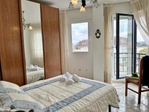 a bedroom with a bed and a large window at Isla Mar - 5833 in Isla