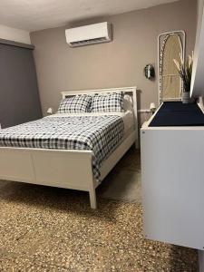 Postel nebo postele na pokoji v ubytování Villa Orquidea 1