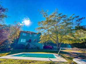 a pool in the yard of a house at Casa Verde in La Cumbre