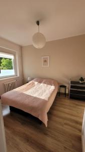 Postel nebo postele na pokoji v ubytování Pokoje Gościnne Gdańsk Hallera + 11 fotografií