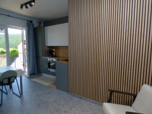 Kuchyň nebo kuchyňský kout v ubytování Apartment Walter