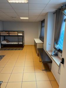Łóżko lub łóżka w pokoju w obiekcie HOSTEL Cangas