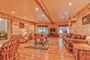 a living room filled with furniture and a tv at Crane - Unit 6 in Bend