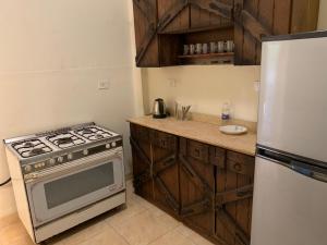 A kitchen or kitchenette at Prime location 2 bed rooms Apartment , near the Nile & Cairo Center