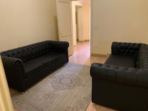 A seating area at Prime location 2 bed rooms Apartment , near the Nile & Cairo Center
