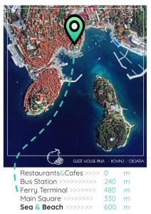 a map of a city with a marker on it at Guest House Pina in Rovinj