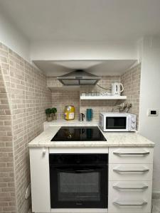 Kuchyň nebo kuchyňský kout v ubytování GAE'S HOUSE