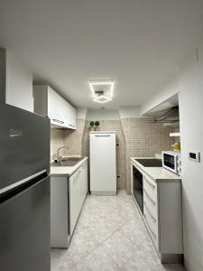 Kuchyň nebo kuchyňský kout v ubytování GAE'S HOUSE