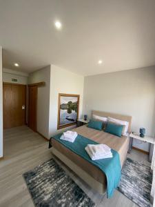 Łóżko lub łóżka w pokoju w obiekcie Douro Visit House