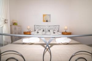 Postel nebo postele na pokoji v ubytování Villa Mediterana