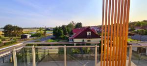 a view of a city from a building at Zalamo in Kąty Rybackie