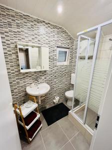 a bathroom with a sink and a toilet at Apartment Bagaric in Stari Grad