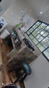 an overhead view of an office with a desk and a chair at Cabaña El Oásis in Moniquirá
