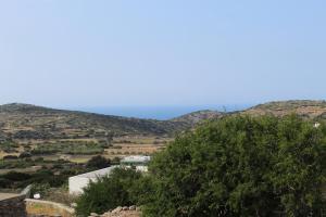 a view of a valley with mountains in the background at Cycladic Villa in Amorgos Island (Maison Shiro) in Arkesíni
