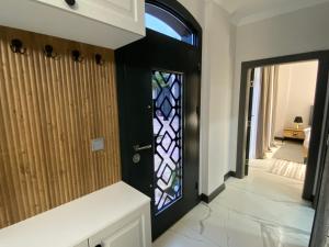 A bed or beds in a room at Kartal Konağı