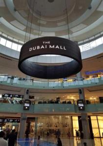 a sign for the dubai mall in a shopping mall at Luxe - Fashion Avenue Dubai Mall - Formerly Address Dubai Mall in Dubai