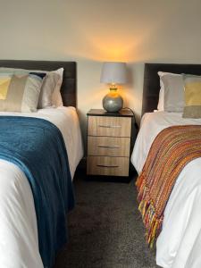 A bed or beds in a room at Bella Ripley