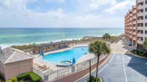 a view of a swimming pool and the beach at Hello Sunshine Steps To the Beach in Destin