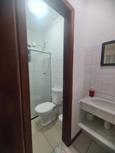 Ένα μπάνιο στο Apartamento aconchegante +9 φωτογραφίες