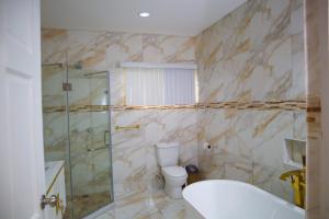 Ванная комната в Escappé Suites