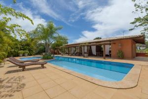 an image of a swimming pool at a house at Breeze 09 Imbassaí in Imbassai