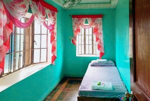 Llit o llits en una habitació de Cadaya Resorts