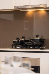 Stylish 1BD Apt with Ideal Location in Southbank的厨房或小厨房