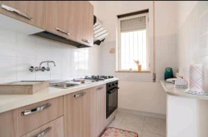 A kitchen or kitchenette at Casa Gioia