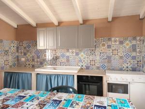 A kitchen or kitchenette at Casa Gioia