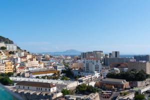 a view of a city with buildings and the ocean at Seaside Serenity Oasis - High floor - Stunning Views - 1BR in Gibraltar