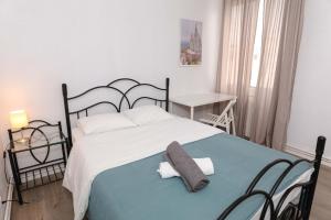 Postel nebo postele na pokoji v ubytování Apartment Carrer de Joan