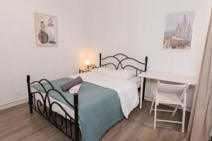 Postel nebo postele na pokoji v ubytování Apartment Carrer de Joan