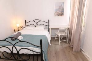 Postel nebo postele na pokoji v ubytování Apartment Carrer de Joan