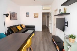 TV a/nebo společenská místnost v ubytování Apartment Carrer de Joan