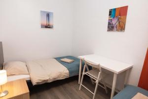 Postel nebo postele na pokoji v ubytování Apartment Carrer de Joan