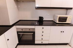 Kuchyň nebo kuchyňský kout v ubytování Apartment Carrer de Joan