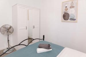 Postel nebo postele na pokoji v ubytování Apartment Carrer de Joan