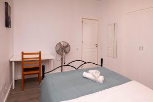 Postel nebo postele na pokoji v ubytování Apartment Carrer de Joan