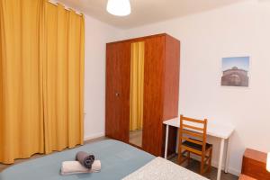 Postel nebo postele na pokoji v ubytování Apartment Carrer de Joan