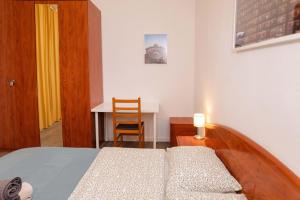 Postel nebo postele na pokoji v ubytování Apartment Carrer de Joan