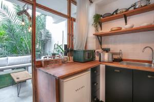 Kuchyň nebo kuchyňský kout v ubytování 62 HOME