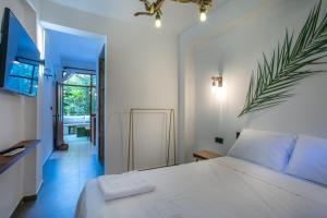 Postel nebo postele na pokoji v ubytování 62 HOME