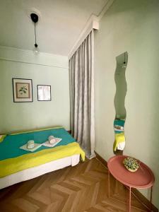 Postel nebo postele na pokoji v ubytování Διαμέρισμα στο κέντρο της Θεσσαλονίκης!