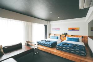 Postel nebo postele na pokoji v ubytování Anchor Hotel Fukuyama