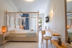 Postel nebo postele na pokoji v ubytování Bourtzi Hotel + 31 fotografií