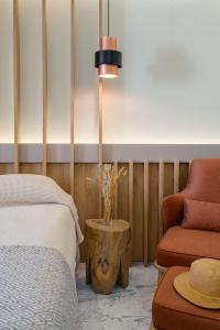 Postel nebo postele na pokoji v ubytování Bourtzi Hotel