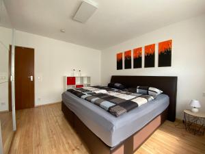 Postel nebo postele na pokoji v ubytování Ferienwohnung Stiefelmühle