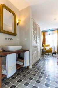 a bathroom with a sink and a mirror at Hotel Pop Alaçatı in Alaçatı +77 photos