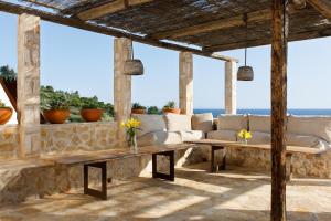 a living room with a couch and a table at Villa Vito in Hvar