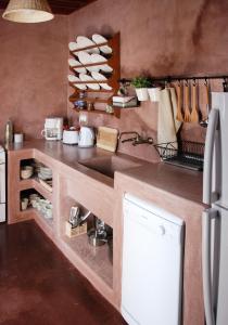 Kuchyň nebo kuchyňský kout v ubytování Casa Lindos + 29 fotografií